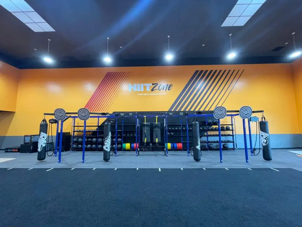 finished display of fitness gym with punching bags and weights