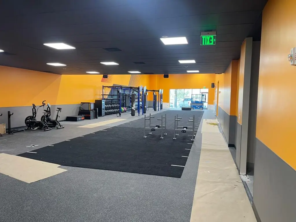 view from the back of fitness gym with different equipment
